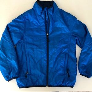 REI blue lightweight water resistant jacket.